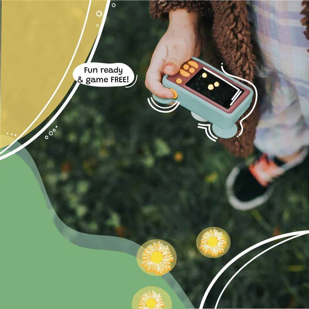 Kid holding kiimento Model C Bear digital camera in hand, game-free and designed for fun photo play.