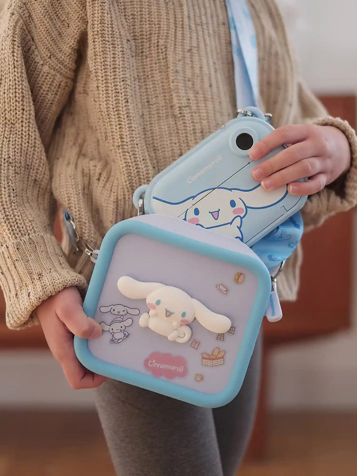 Person holding kiimento Sanrio Cinnamoroll Print Camera Model P and Cinnamoroll Camera Bag – matching set